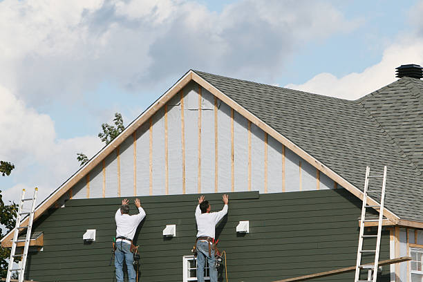 Professional Emergency Siding Repair technician working in Arvonia, VA